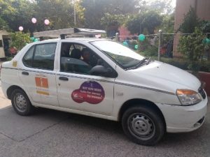  Professional chauffeur Pinki driving a Sakha cab. 